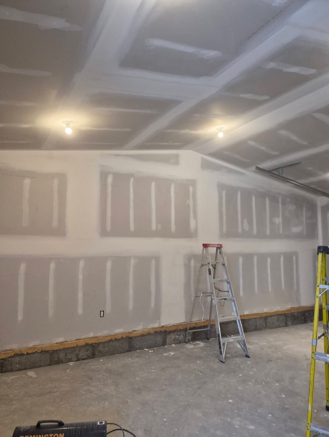 Anderson Renovations — Garage drywall and taping