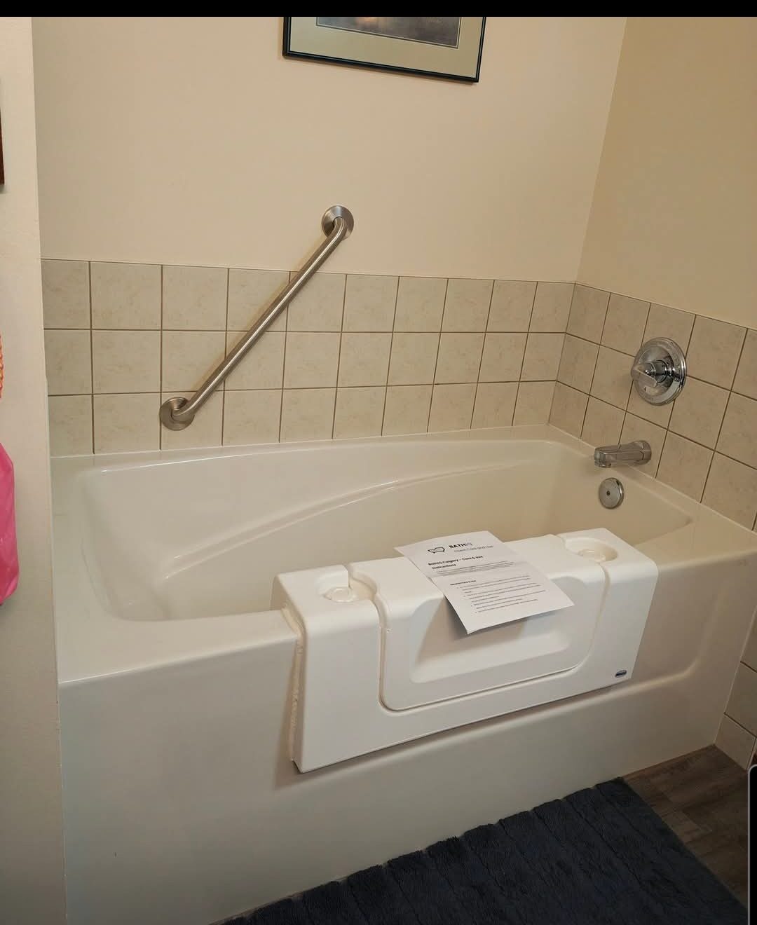 Bath IQ Calgary — Tub cut-out with grab bar for safe step-through access