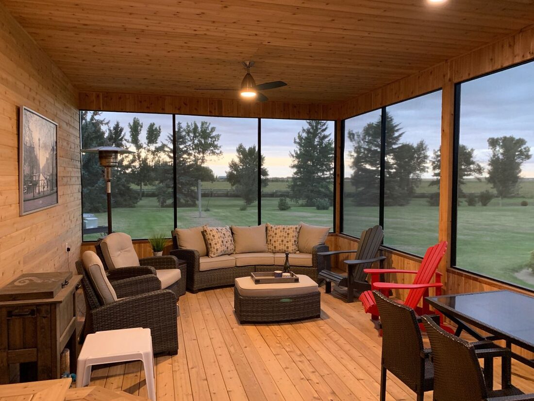 Goldland Construction Inc. — Covered sunroom & deck