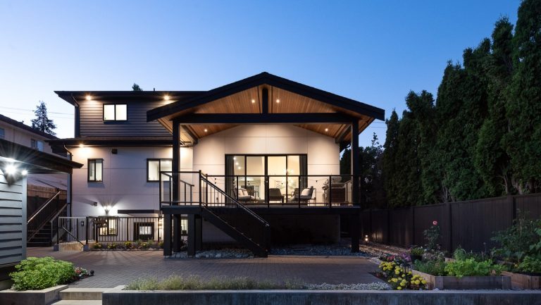 Rechsteiner Signature Homes — Modern home at dusk