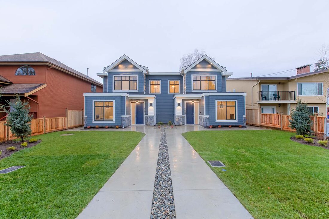 By Design Construction Inc — Custom home exterior