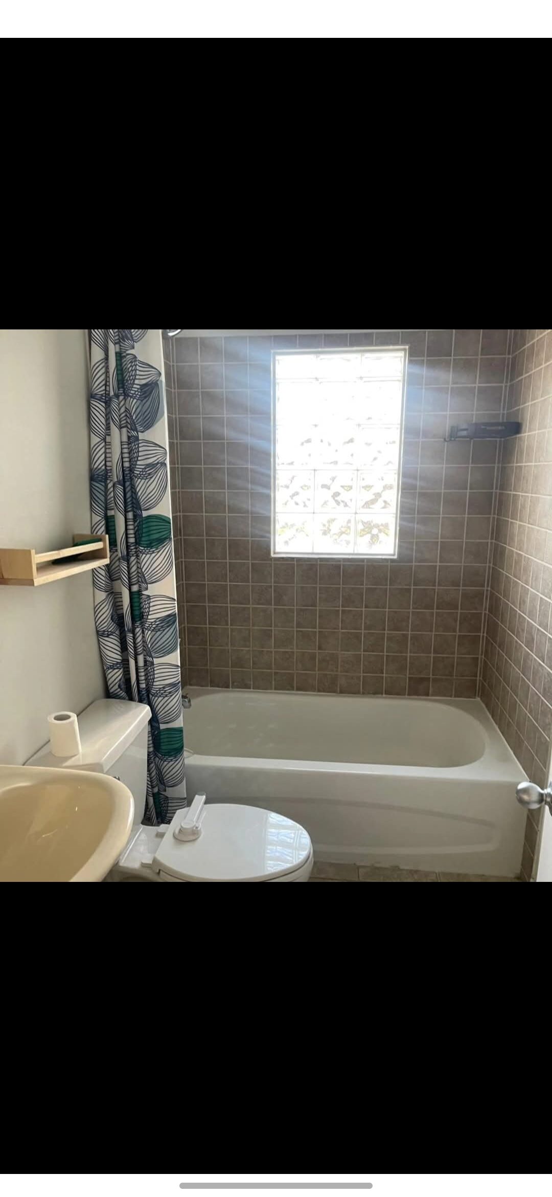 Bergen Renovation — before: Bathroom renovation — dated tub surround transformed into a marble walk-in shower