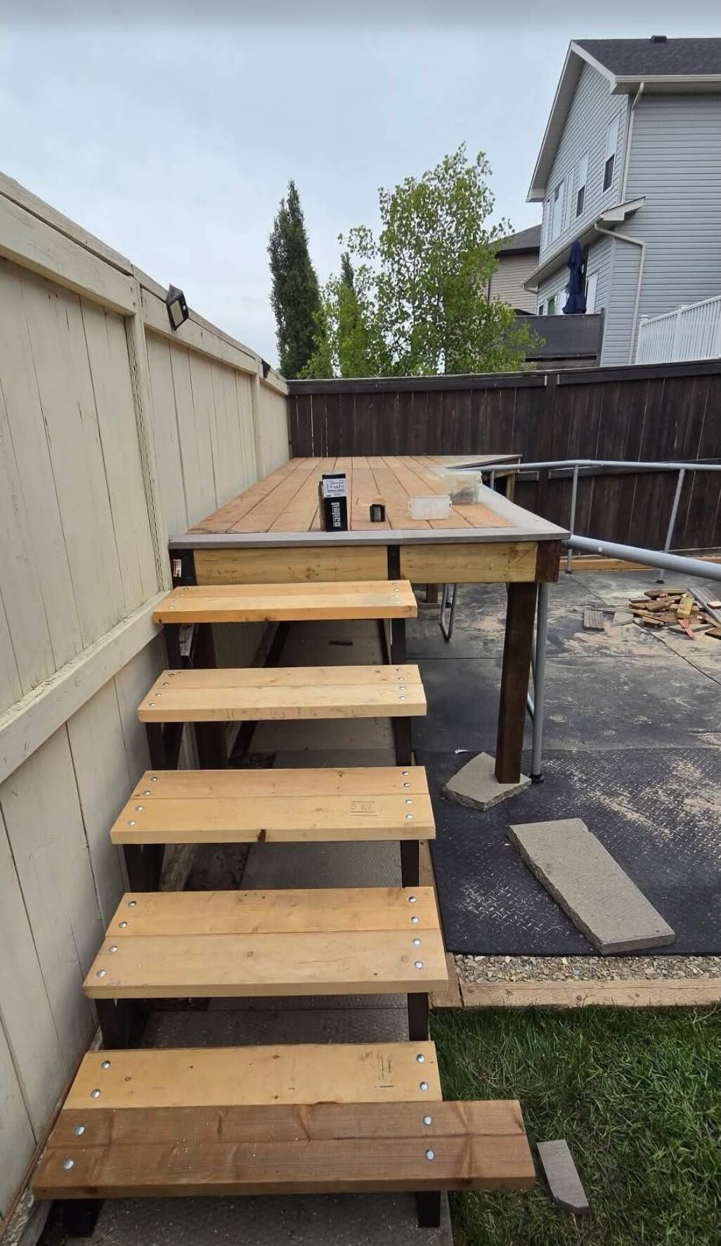 Crawfords Construction — Cedar deck with floating stairs