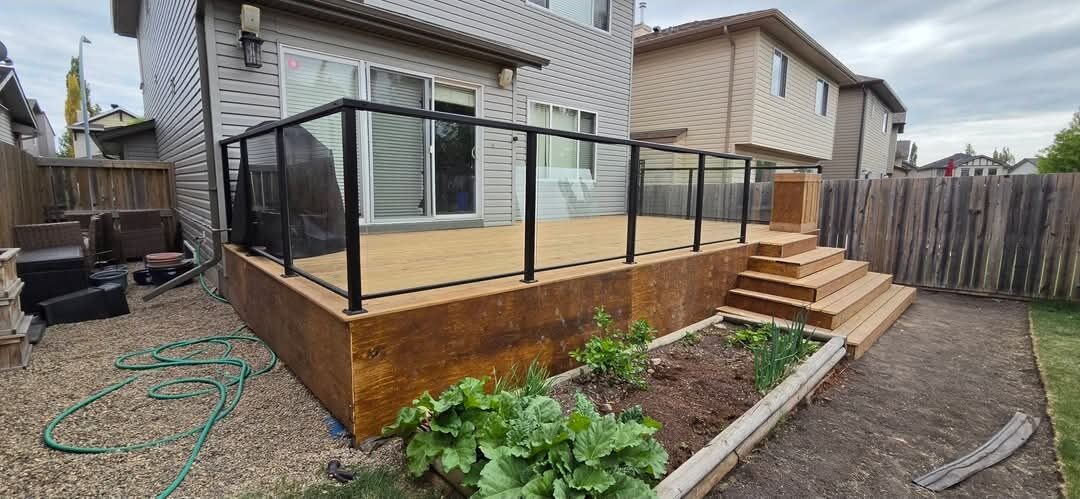 Crawfords Construction — Raised deck with glass railing