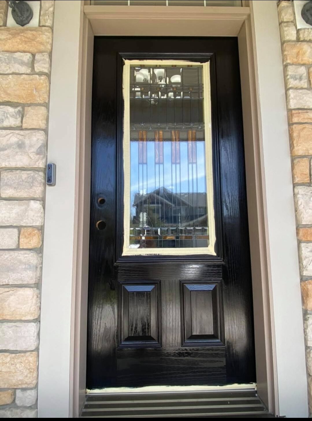 Euro Brothers Painting Calgary — Front door refinished in gloss black