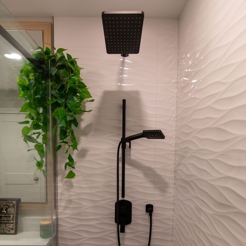 Versatile Renovations — Walk-in tile shower