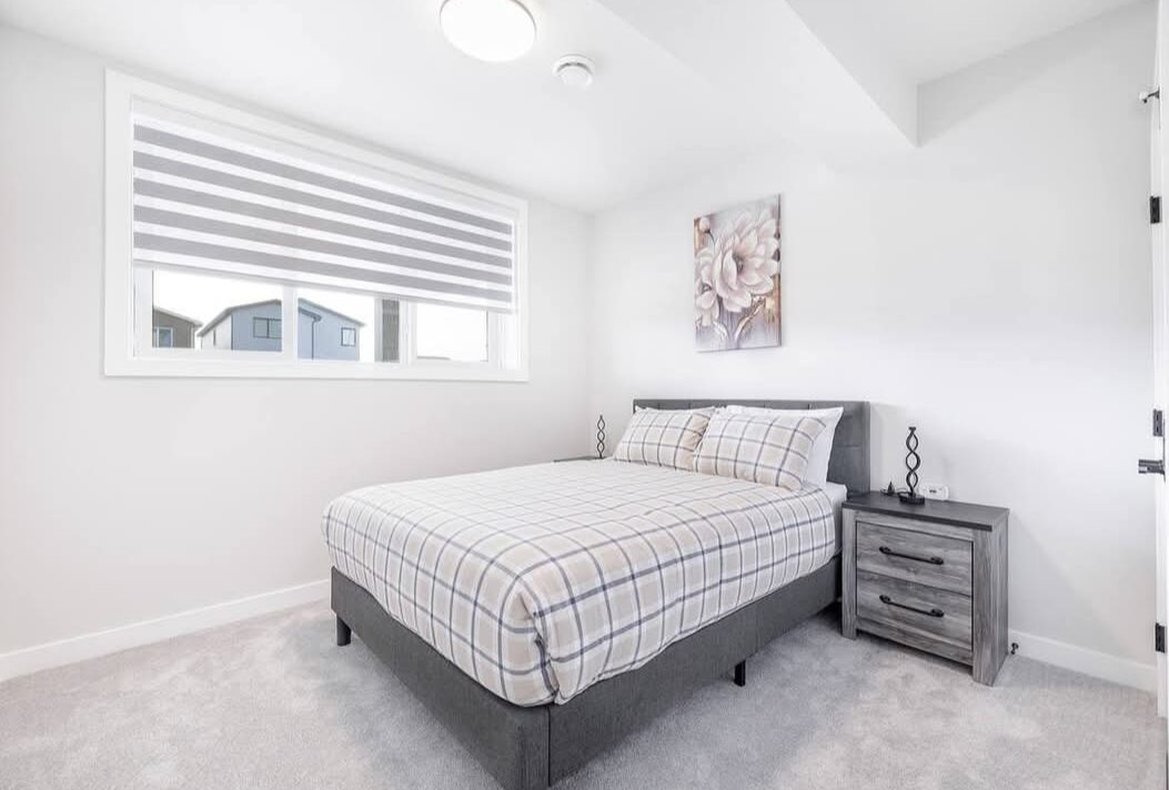 EliteCity Construction Ltd. — Basement suite bedroom