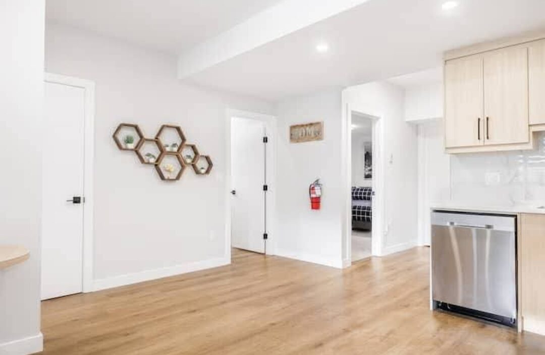 EliteCity Construction Ltd. — Basement kitchen and hallway