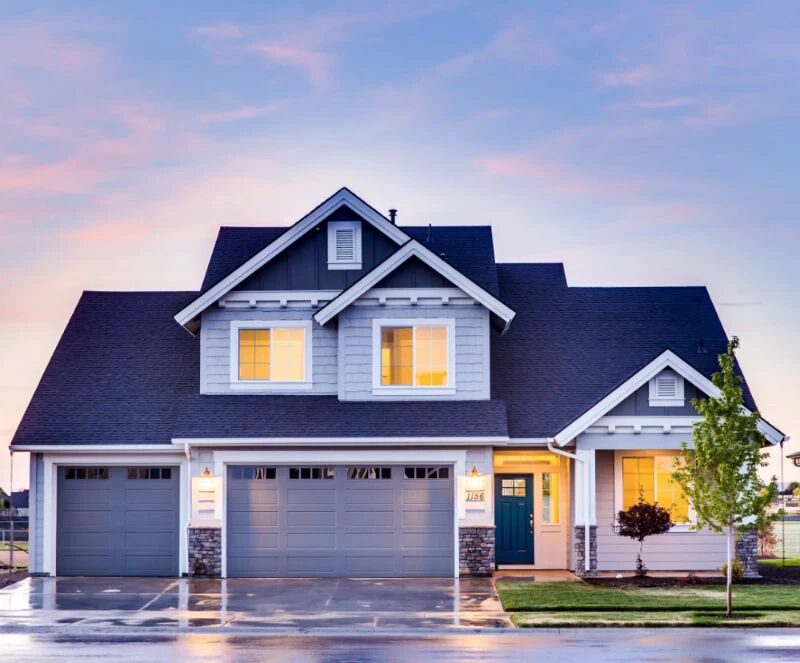 RB Custom Framing — Custom home at dusk
