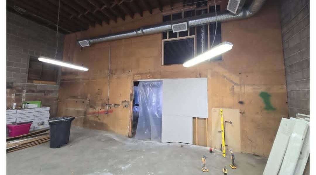Form & Finish Drywall Ltd — Commercial shop before drywall
