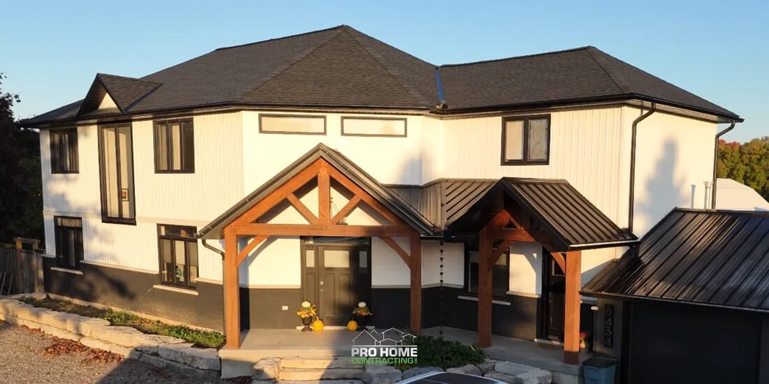 Pro Home Contracting Inc. — Custom home with timber entry