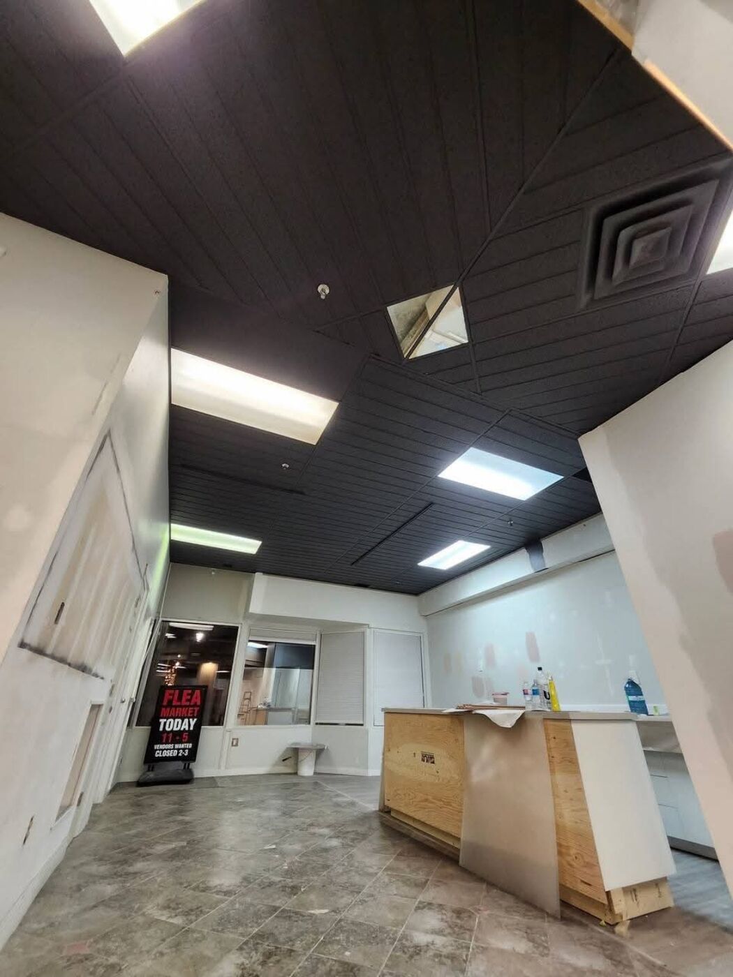 Done Right Renovations — Retail space renovation — ceiling tile and lighting work
