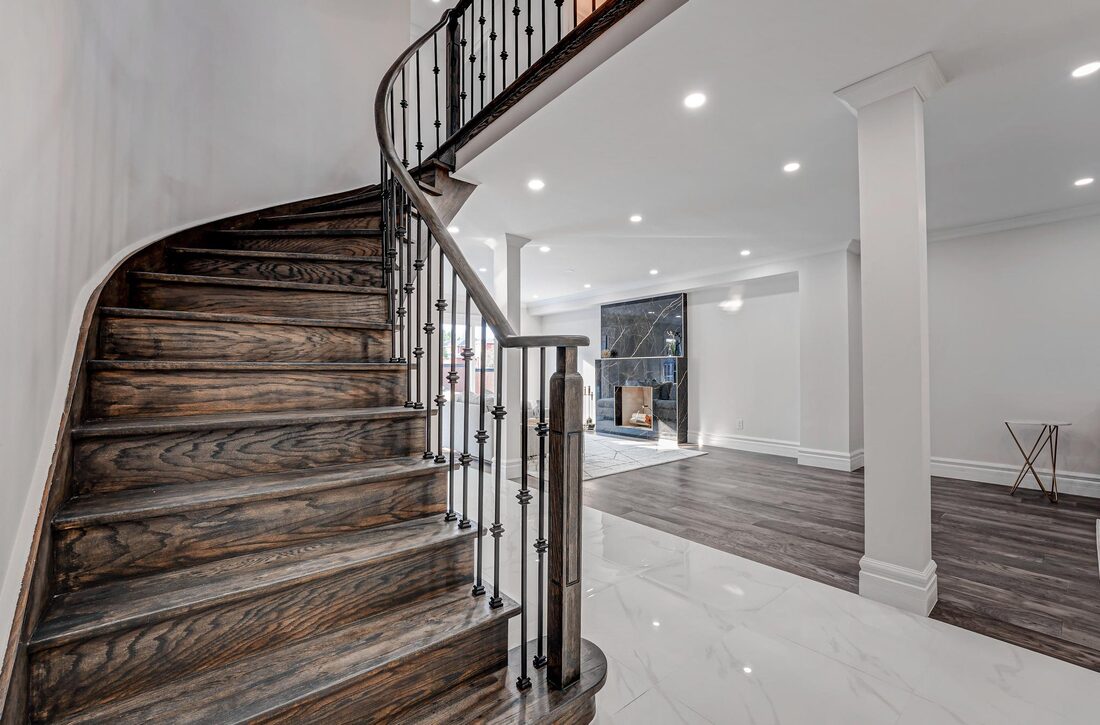 SHAM CONTRACTING & RENOVATIONS INC. — Custom curved staircase