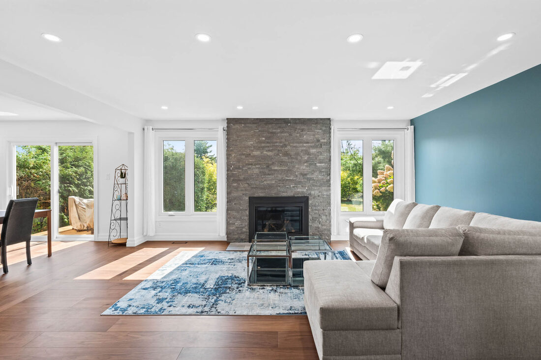 Select Urban General Contractors Inc. — Living room with fireplace