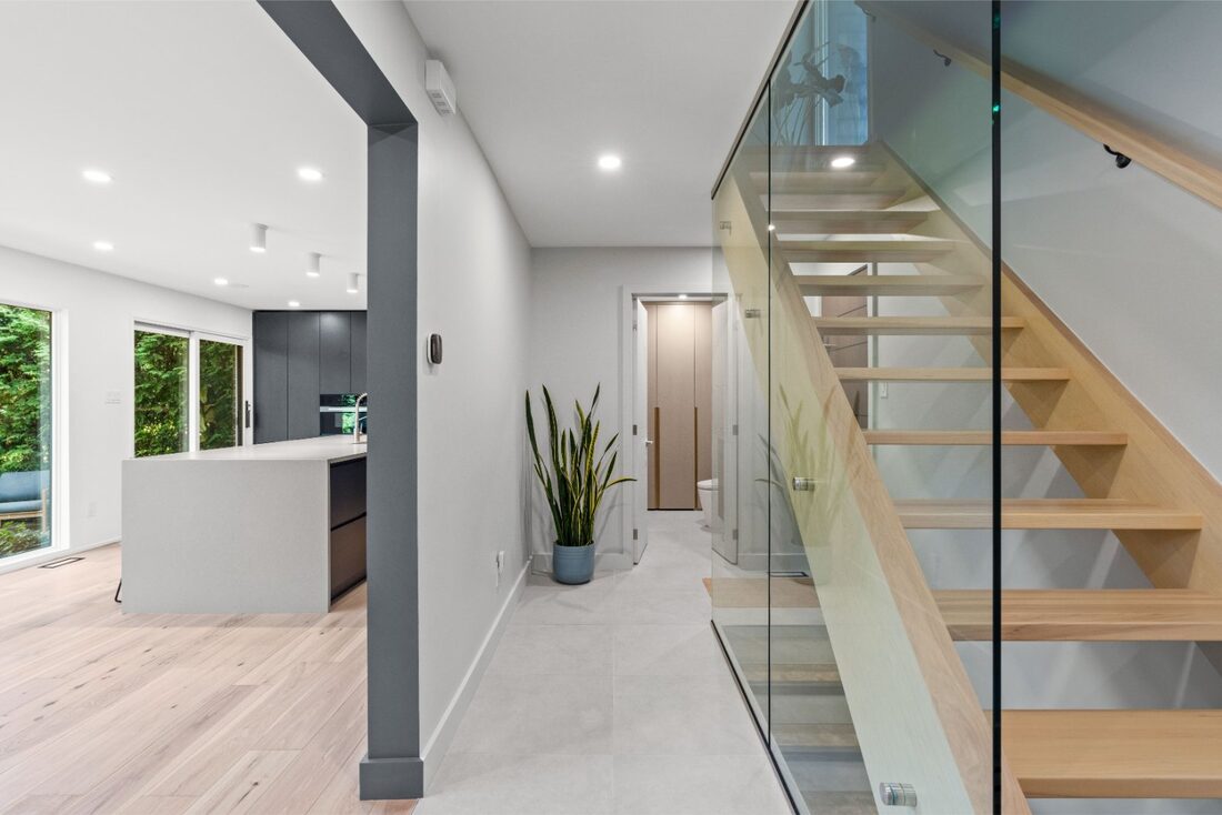 Select Urban General Contractors Inc. — Glass railing staircase