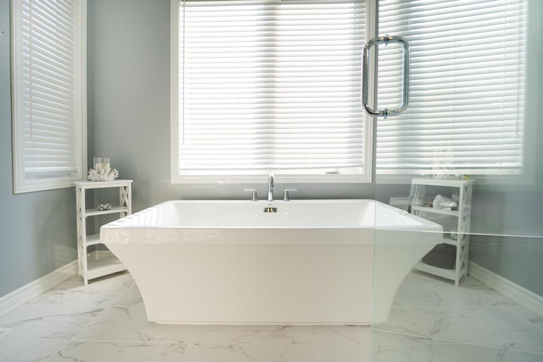 Ottawa Home Renovation by Greenlight Renovation — Ensuite with freestanding tub