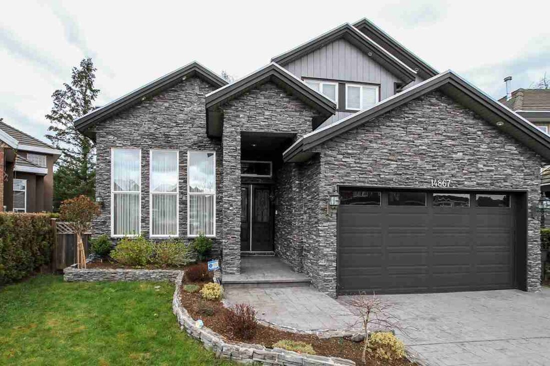 K4 Construction — Custom stone-front home