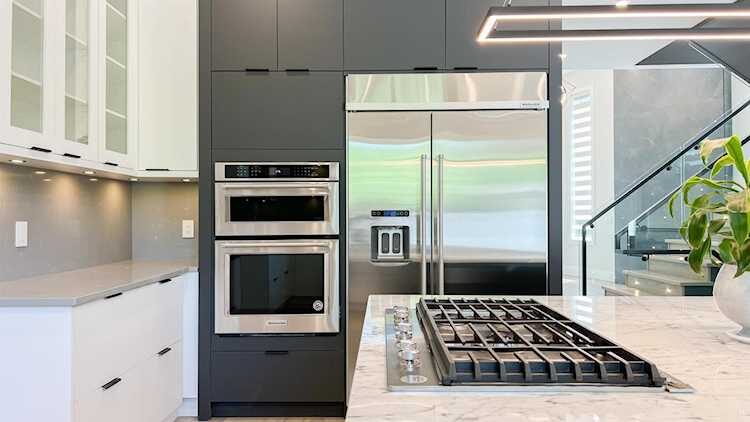 Merit Homes — Modern kitchen with stainless appliances