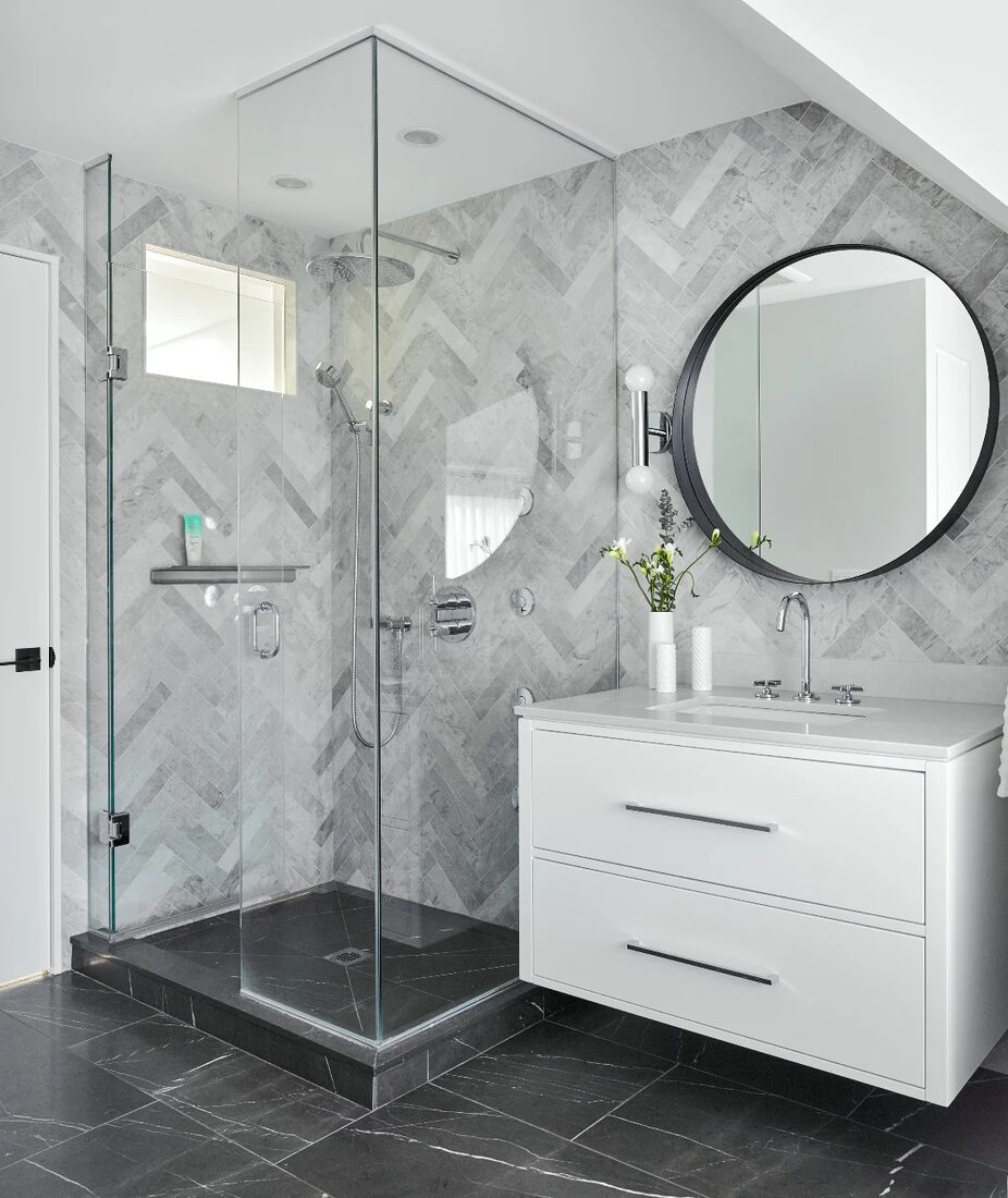 Weenen General Contracting Limited — Marble bathroom with glass shower
