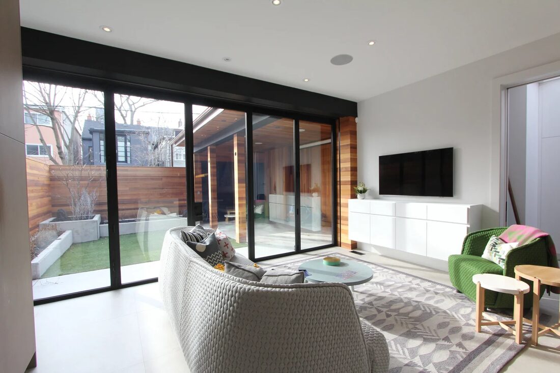 Weenen General Contracting Limited — Glass-walled sunroom addition