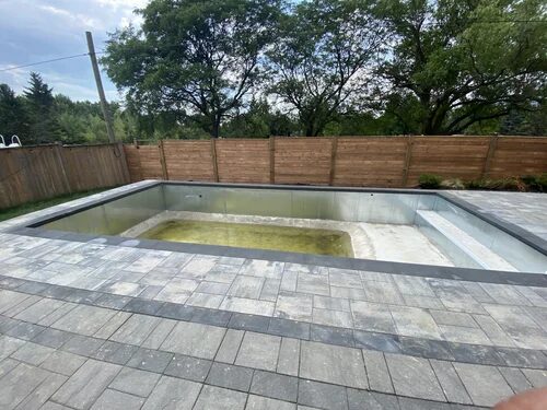 West Toronto Home Renovations — Pool with interlocking patio