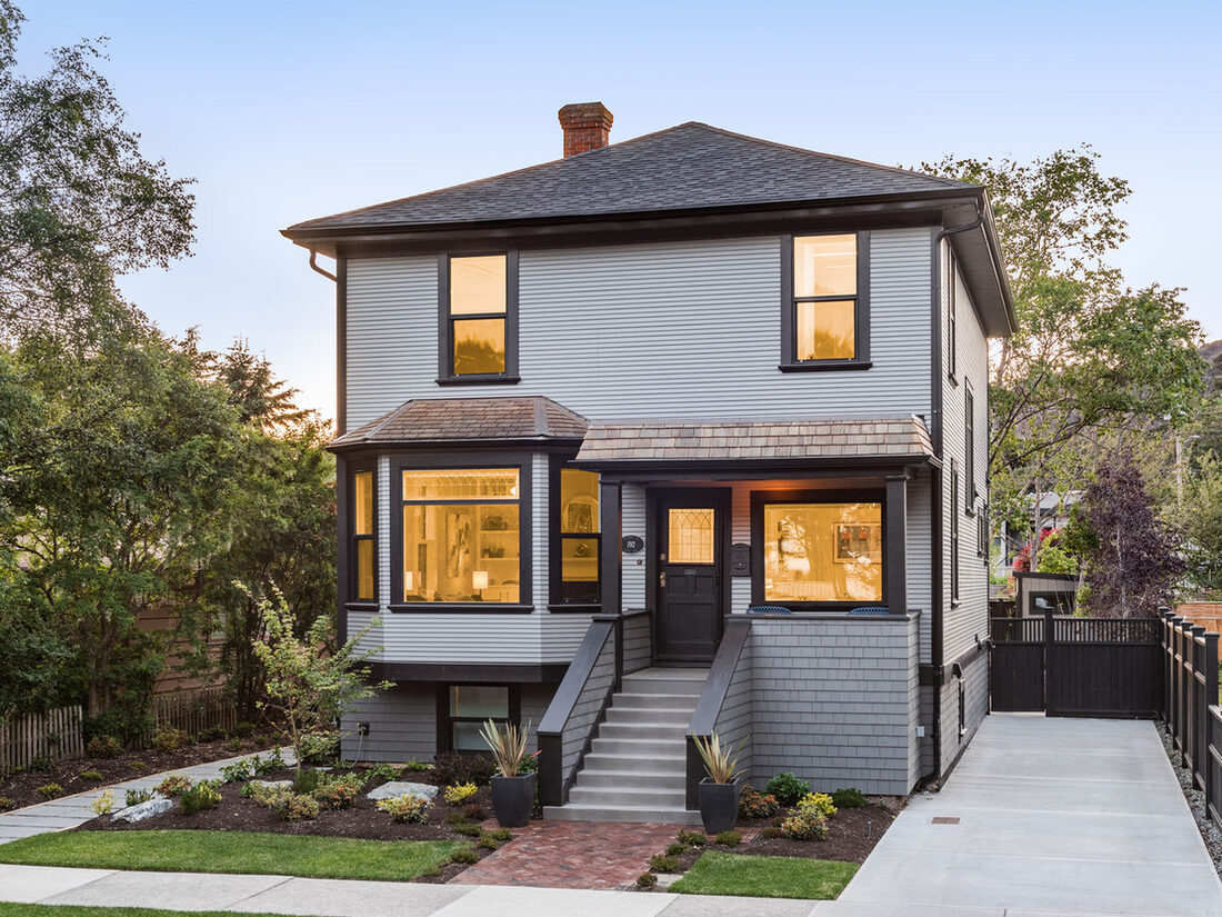 MacMinn Contracting — Home exterior at dusk