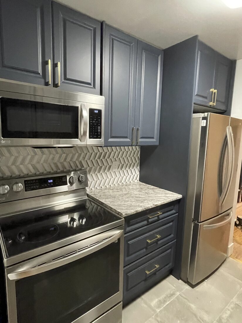 House Standing Renovations Victoria — Kitchen with dark cabinets