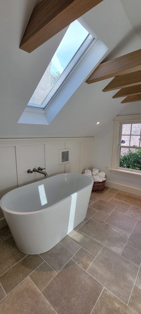 Revere Interior Construction — Skylight bathroom