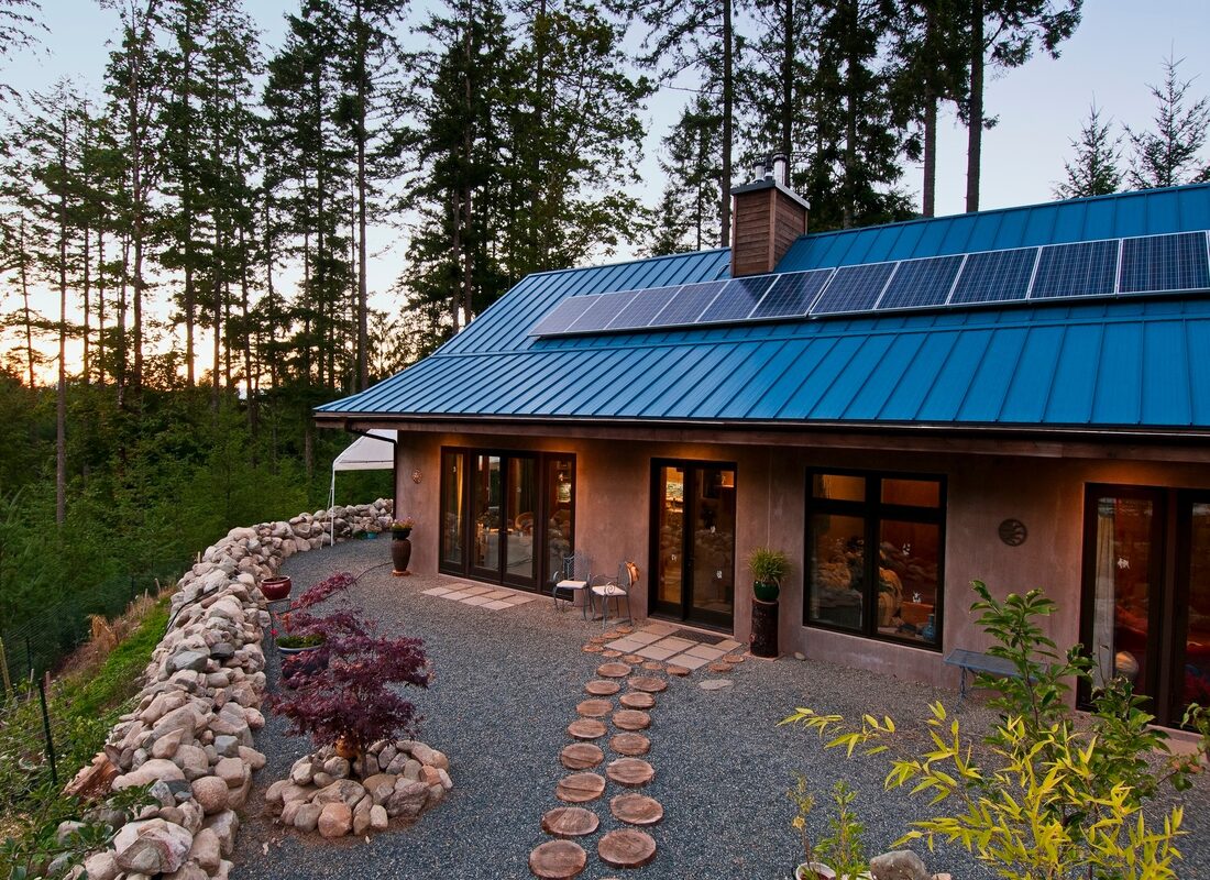 NZ Builders Ltd. — Home exterior with blue roof