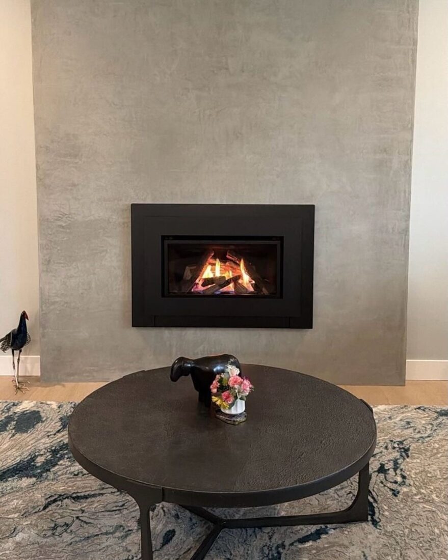 NZ Builders Ltd. — Living room with fireplace