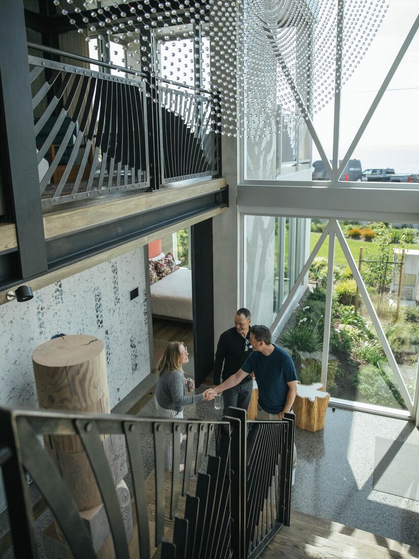 NZ Builders Ltd. — Glass-walled addition
